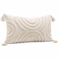 Cojín lumbar 50 x 30 cm textil beige decorativo con borlas estilo bohemio